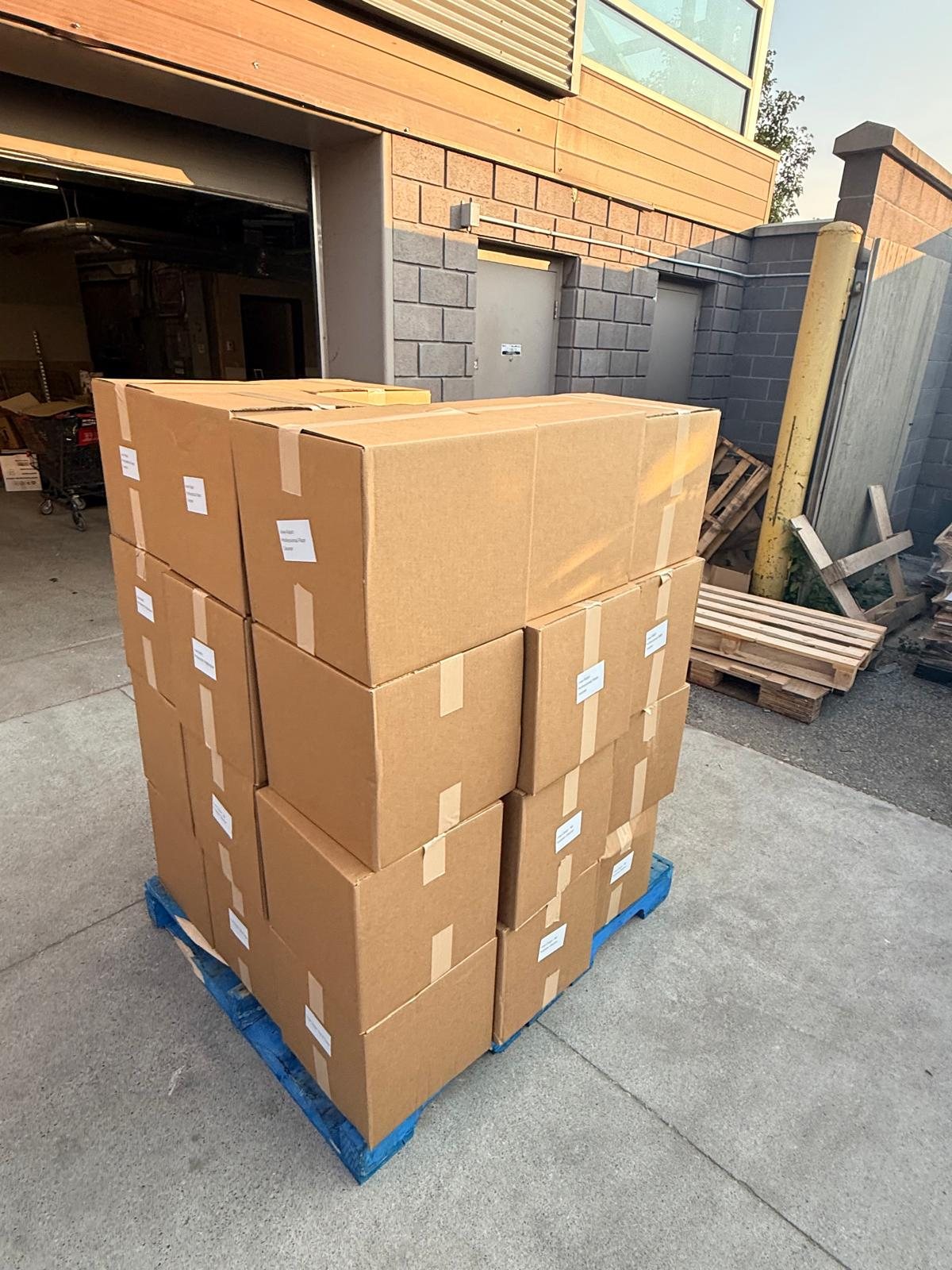 Completed pallet order of VIVE commercial cleaning products ready for customer delivery